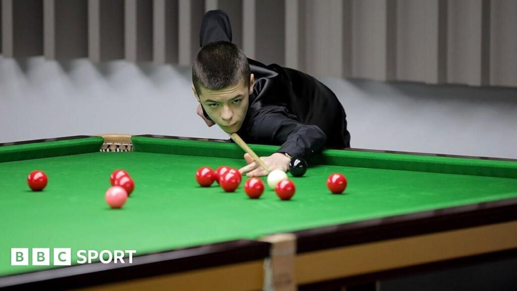 Michal Szubarczyk plays a shot