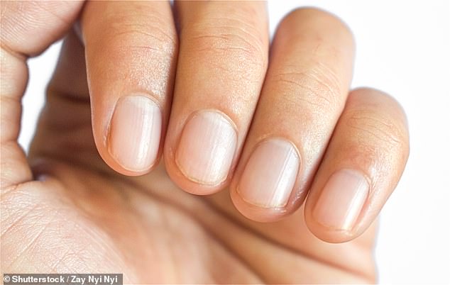 Little-known change to your FINGERTIPS is an early sign of deadly cancer that's on the rise, experts say