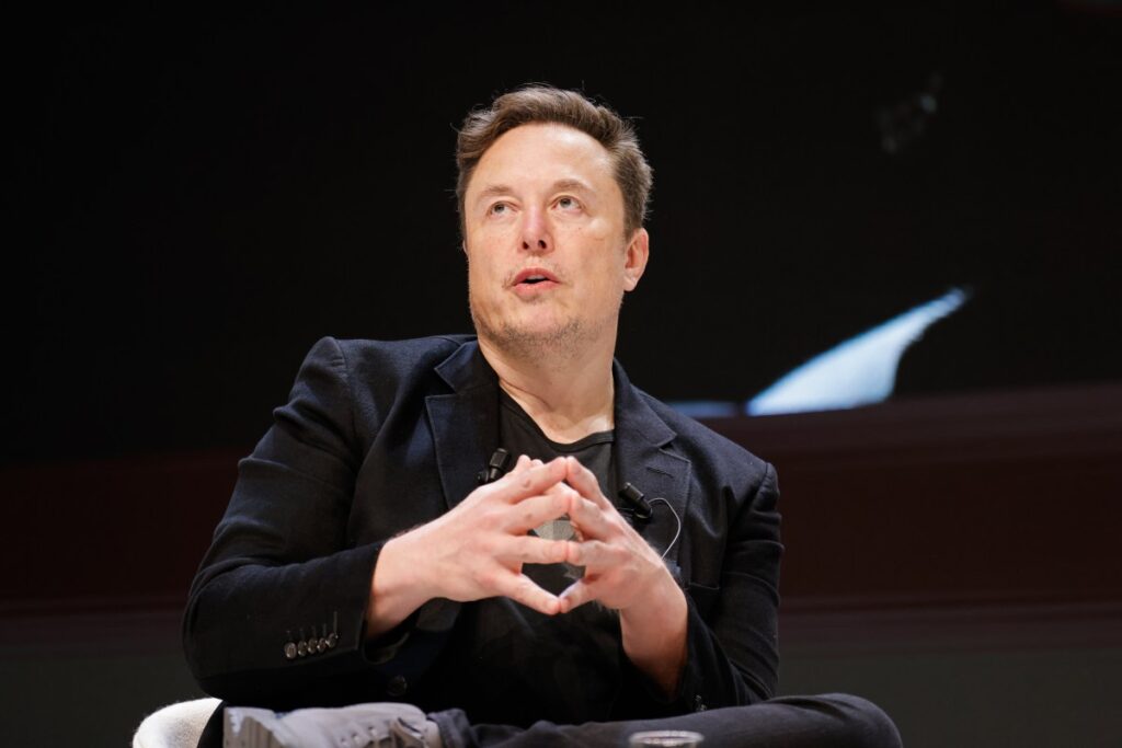 Chief Technology Officer of X Elon Musk speaks onstage during the