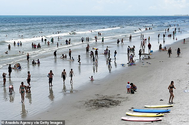 Deadly flesh-eating bacteria spread across beaches... as cases surge in terrifying rise
