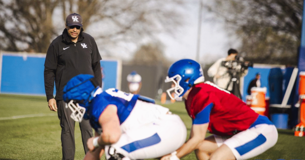 Offensive coordinator Bush Hamdan and the Kentucky quarterbacks, via Aaron Perkins, KSR