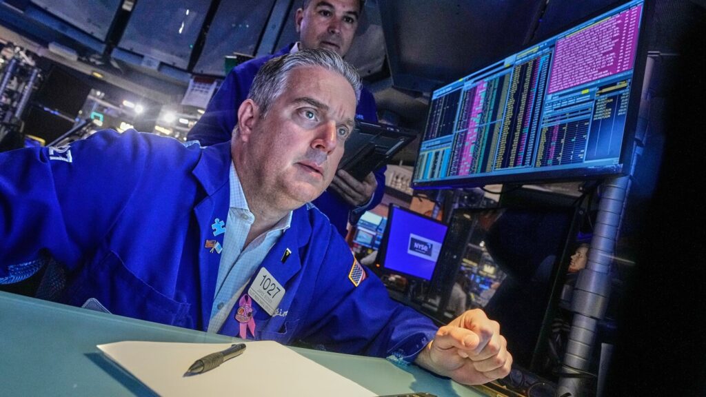 Wall Street wavers as trade tensions flare again with China