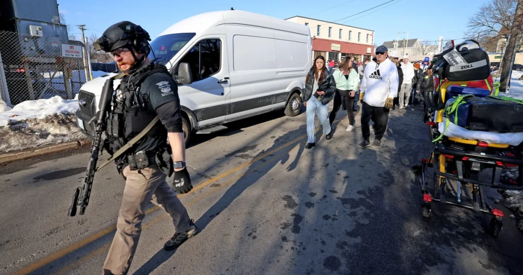 Authorities investigate a shooting incident at a high school hockey match in Pawtucket, Rhode Island.