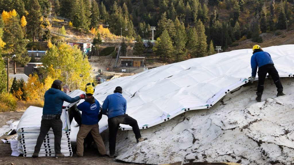 Can covering snow with blankets help preserve the ski season?