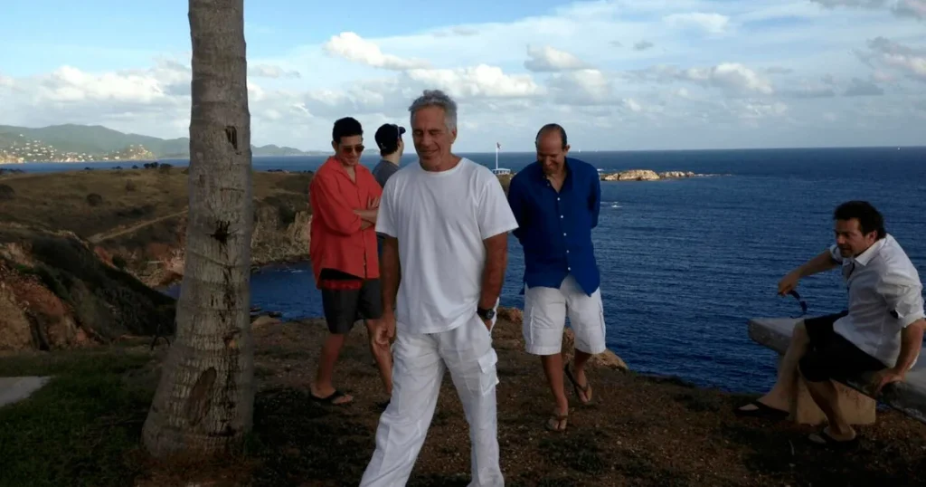 Photo of Lutnick on Epstein's island, previously deleted from Justice Department records, has been reinstated.