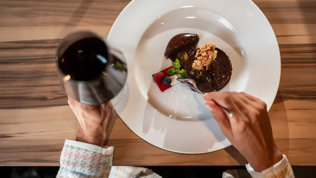 Research indicates that dark chocolate and red wine could enhance brain function via flavor stimulation.