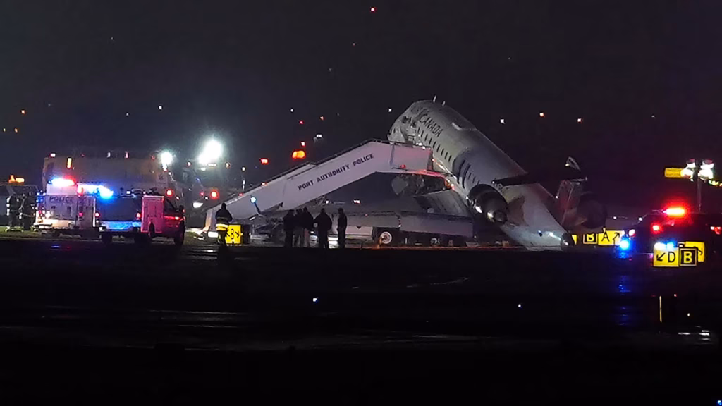 Air Canada aircraft involved in collision with Port Authority vehicle at LaGuardia Airport in New York.
