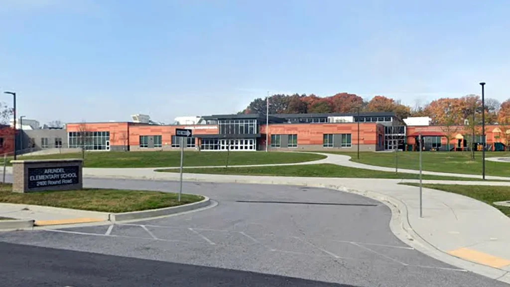 Baltimore elementary school classroom discovered with deceased math instructor.