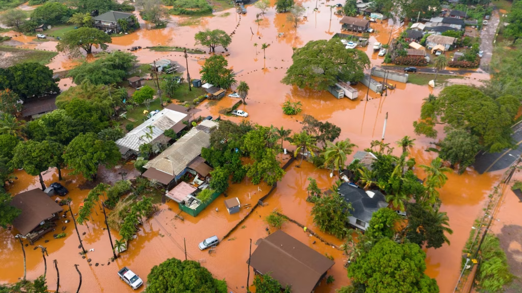 Hawaii experiences the most severe flooding in two decades, with meteorologists predicting additional rainfall.