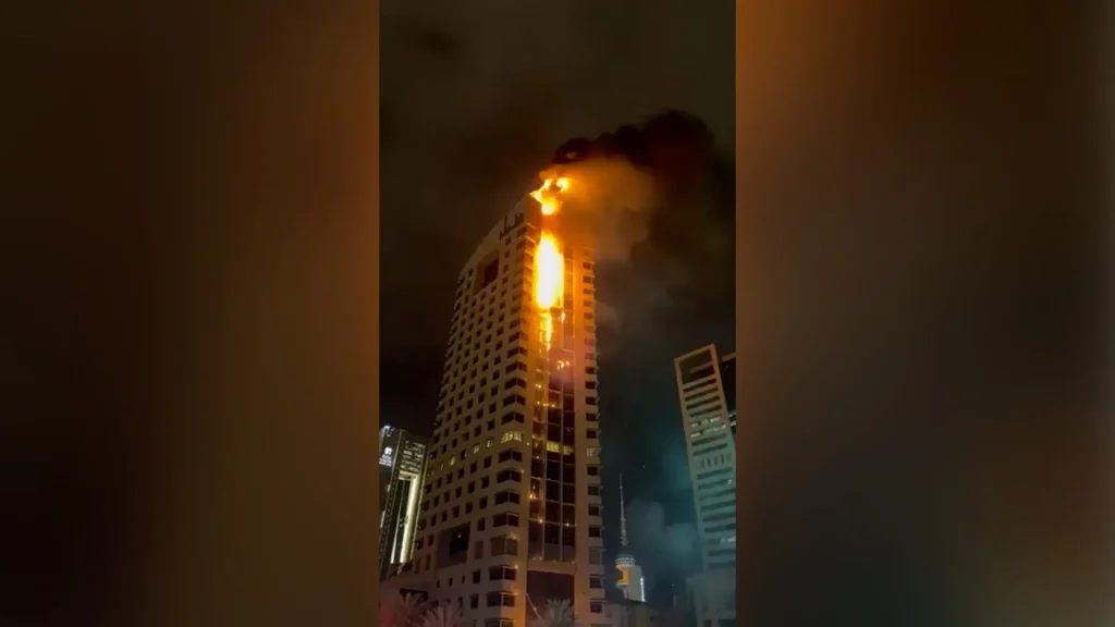 Kuwait high-rise caught in flames during Iranian drone attacks.