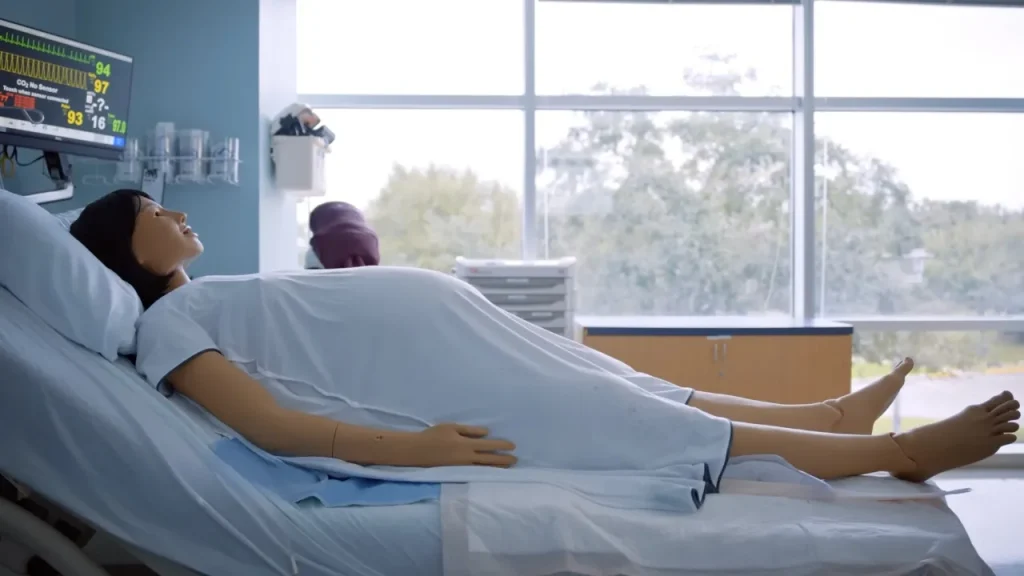 Mama Anne robot aids in training midwifery students at York St John by simulating childbirth.