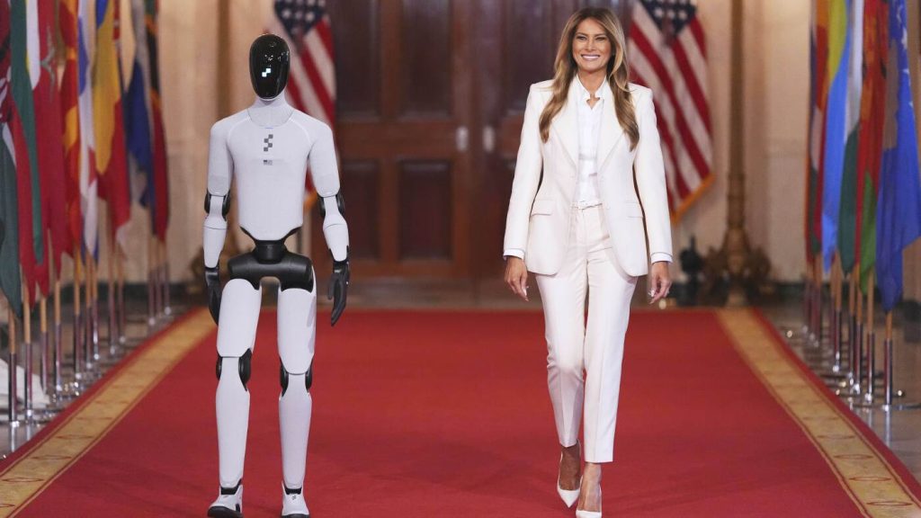 Melania Trump appears alongside a robot at an education and technology conference.
