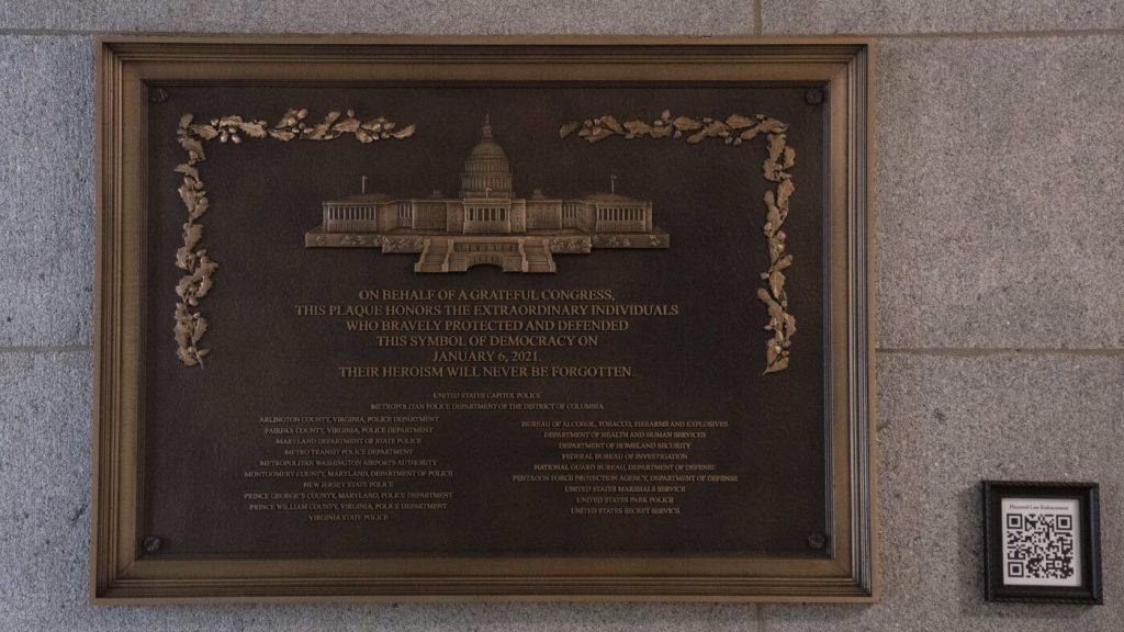 Plaque commemorating law enforcement from January 6 now unveiled at the Capitol after three-year postponement.