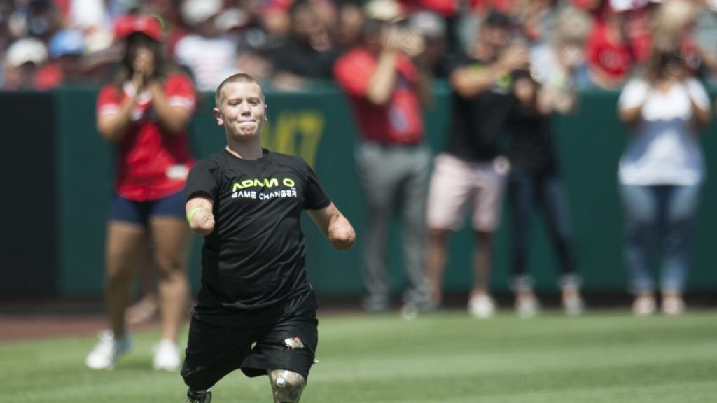 Professional cornhole athlete and quadruple amputee taken into custody for murder charges.