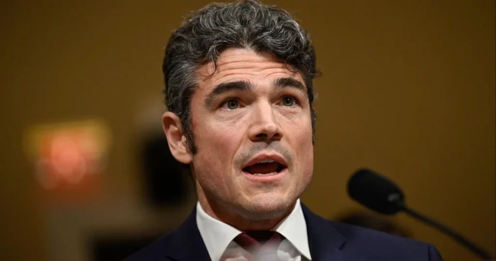 Senior counterterrorism official steps down, citing lack of imminent threat from Iran amidst ongoing conflict.