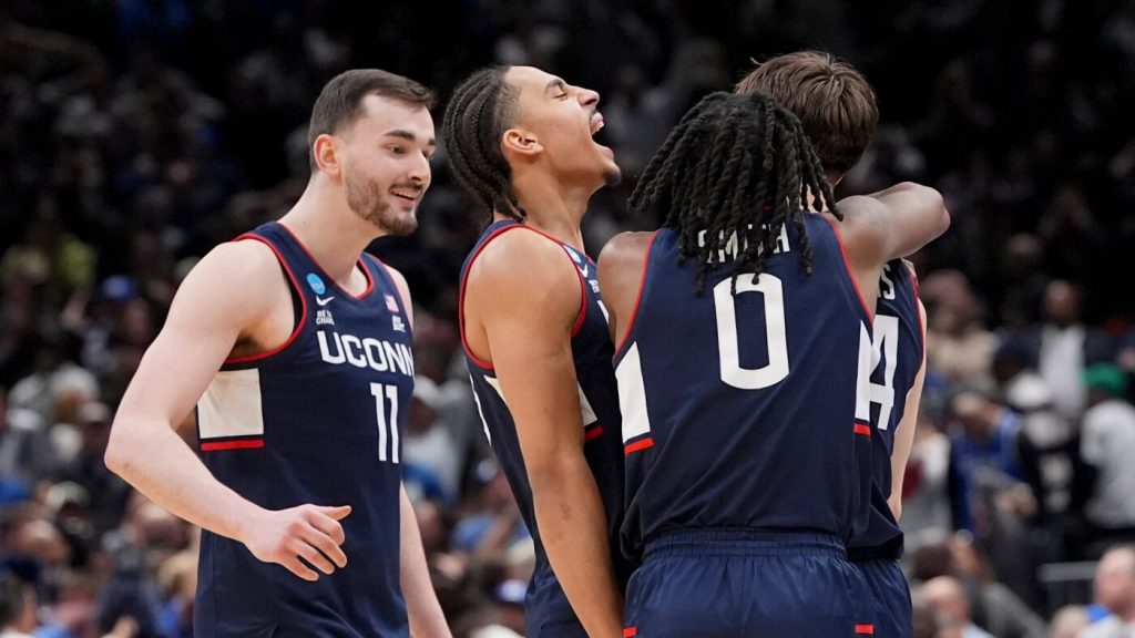 UConn defeats Duke to complete the Final Four lineup with Illinois, Arizona, and Michigan.
