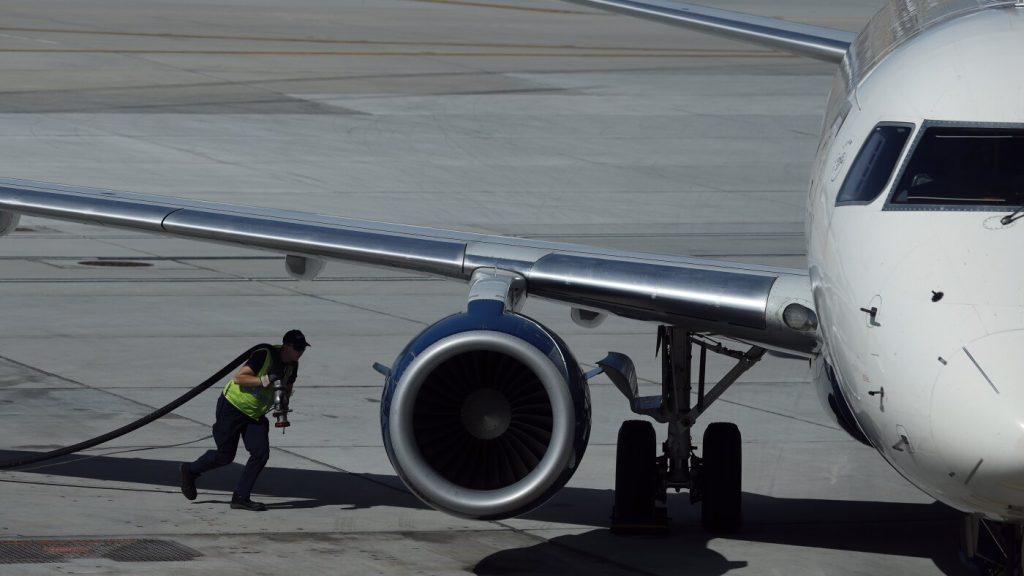 Airlines respond to doubled jet fuel costs by raising ticket prices and baggage fees.