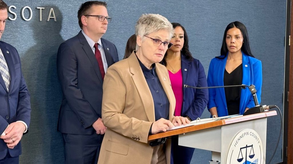 Federal officer in Minnesota faces assault charges for aiming firearm at vehicle amid immigration enforcement increase.