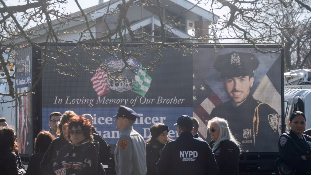 Individual found guilty of murdering NYPD officer receives a sentence of 115 years to life imprisonment.