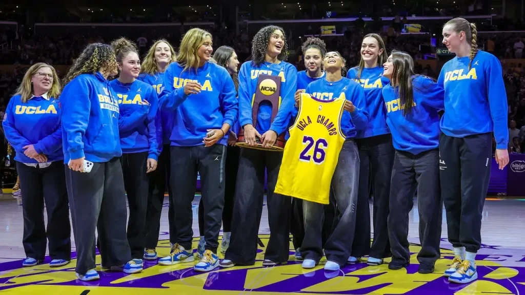 Jimmy Kimmel presents UCLA women's basketball championship trophy to Trump as a prank