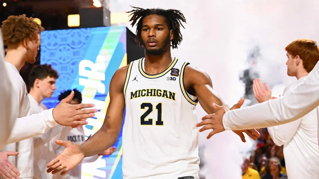 Morez Johnson Jr. from Michigan announces his intention to enter the NBA Draft following championship success.
