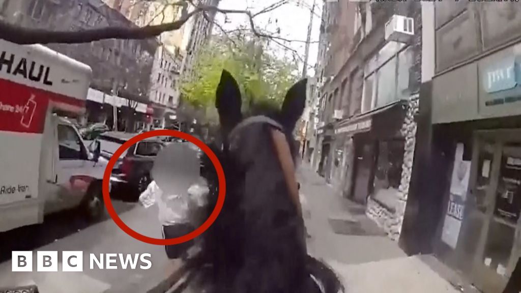 [Mounted police pursue fugitive through the streets of New York City.