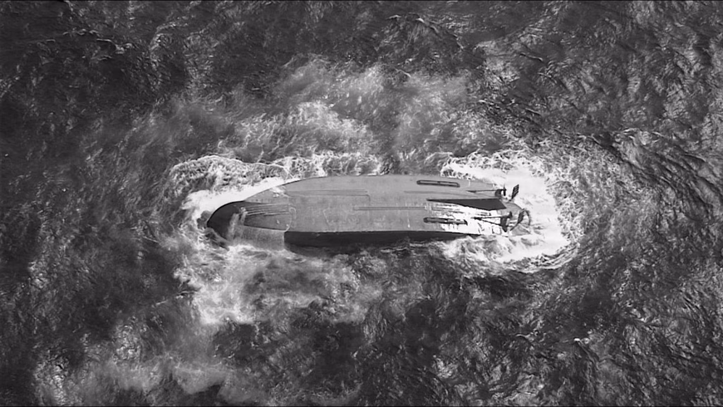 Search efforts halted for crew members of ship overturned during typhoon.