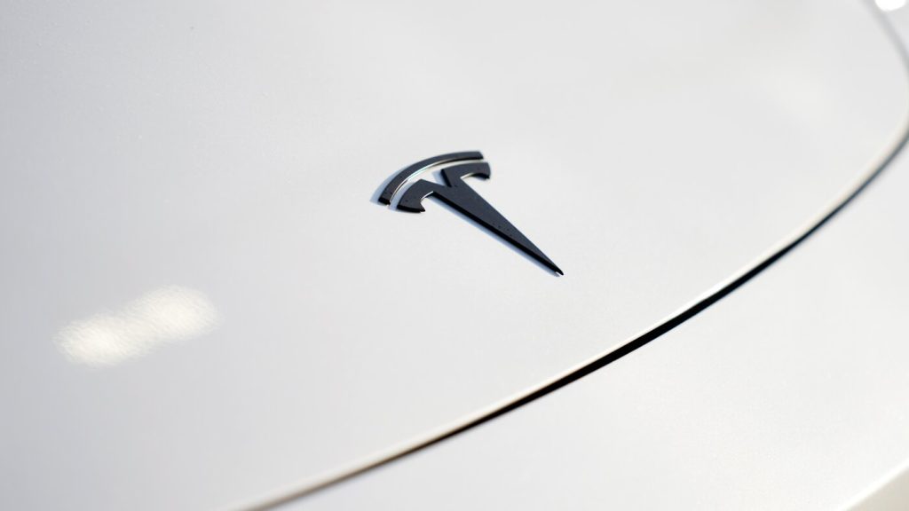 Tesla reports profitability but is preparing for significant new expenditures.