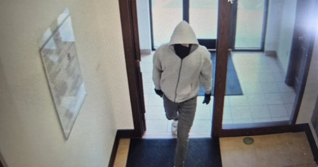 Two bank employees fatally shot during robbery in Kentucky; suspect remains unidentified, authorities report.