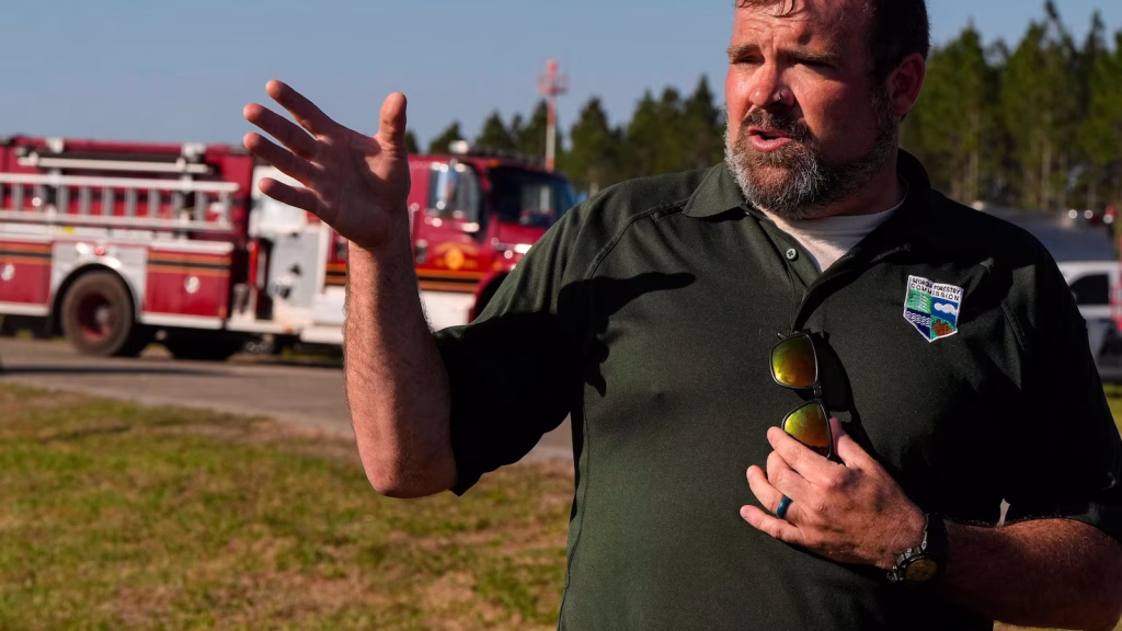 Wildfires in the Southern United States prompt evacuations, leaving residents uncertain about the status of their homes.