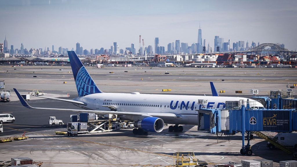 A United Airlines plane collided with a light pole and a truck in New Jersey.