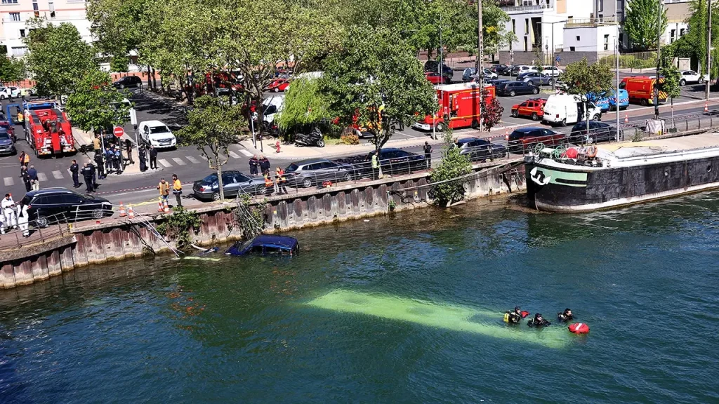 [Bus plunges into River Seine near Paris following incident involving trainee driver, according to reports.