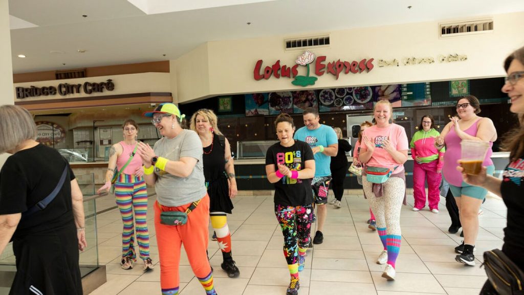 Colorful Portland mall walkers bring enthusiasm to their exercise routine.