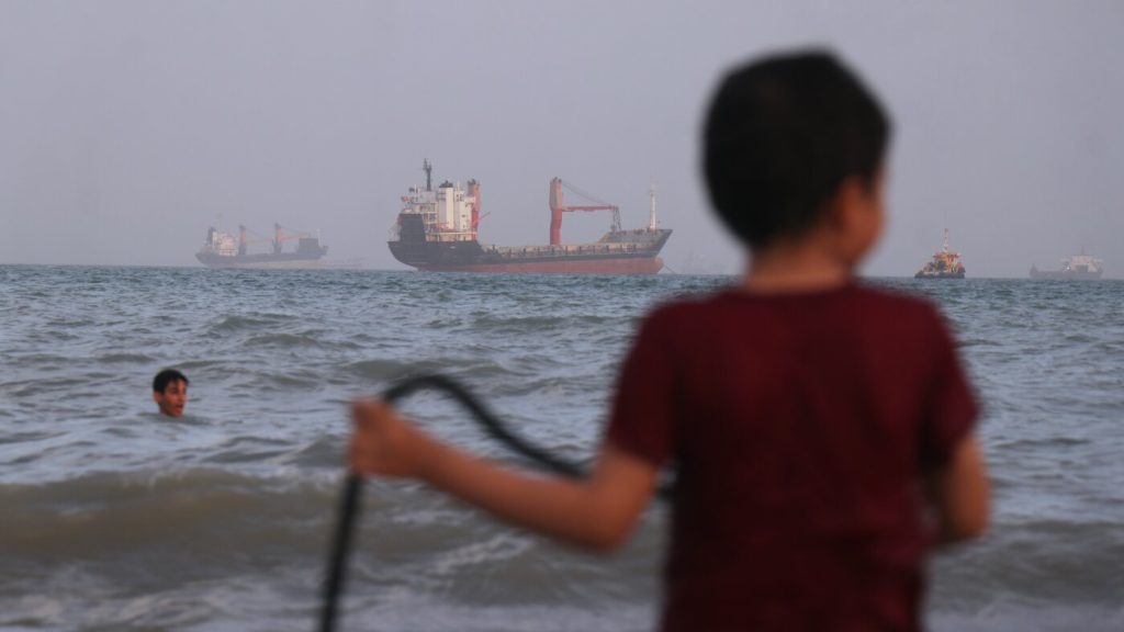 U.S. military reports interception of Iranian assaults on three Navy vessels in the Strait of Hormuz.